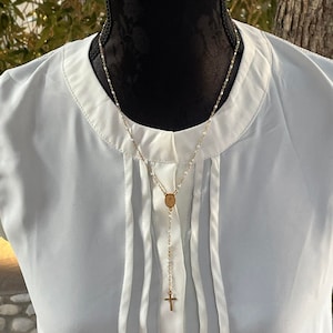 stainless steel rosary style necklace