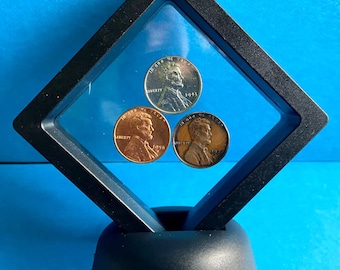 WWII Steel Penny 1940s, Wheat Penny 1930s, & 1958 D Penny In Frame