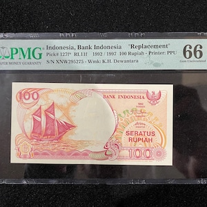Indonesia Bank &quot;Replacement&quot; 100 Rupiah 1992/1997 Pick#127f* PMG 66 EPQ UNC