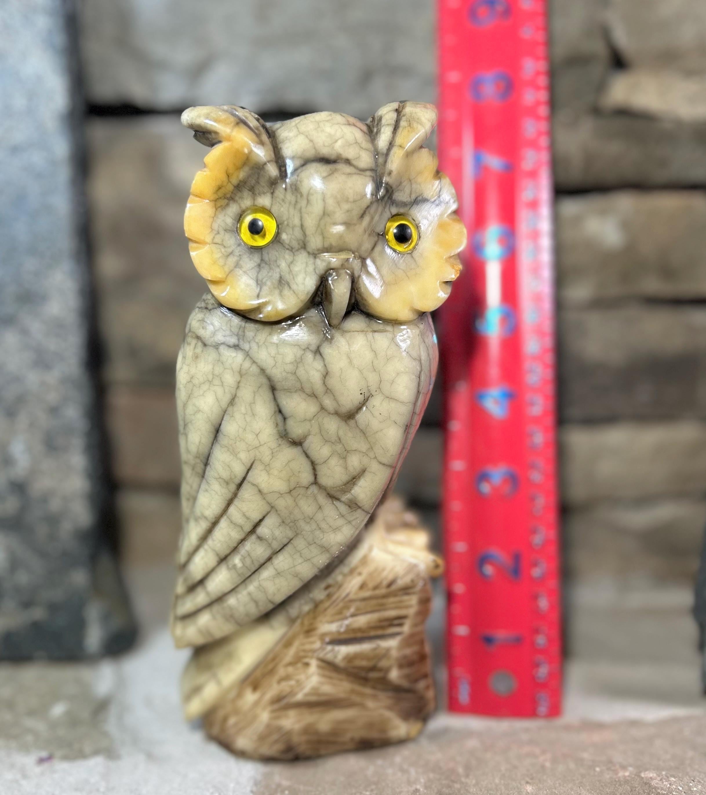 This Antique Marble Owl, carved in the 1920’s, stands perched on a log gazing out with its pie