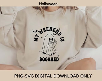 May include: A beige sweatshirt with a black and white graphic of a ghost reading a book. The text on the graphic says "My Weekend Is Boooked".