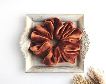 Large voluminous caramel colored velvet hair scrunchie