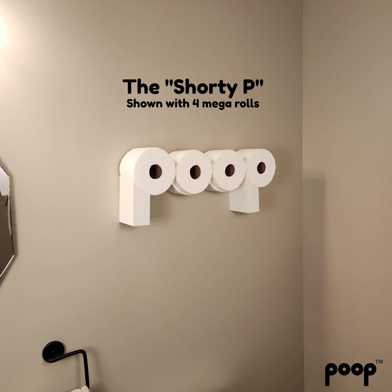 May include: A white toilet paper holder mounted on a beige wall, holding four rolls of white toilet paper. The text "The "Shorty P" Shown with 4 mega rolls" is above the toilet paper holder. The word "poop" is in the bottom right corner.