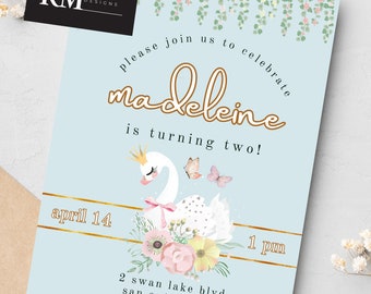 May include: A light blue invitation with a white swan and floral design. The text reads "Please join us to celebrate Madeleine is turning two! April 14, 1 pm, 2 Swan Lake Blvd, San Antonio, TX, RSVP: (555) 555-5555"