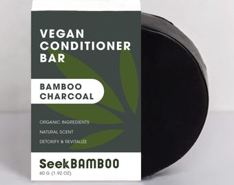 May include: A black vegan conditioner bar with bamboo charcoal, organic ingredients, and a natural scent. The bar is labeled "Seek Bamboo" and is 60 grams (1.92 ounces).