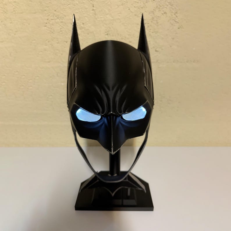 Ben Affleck Batman 3D printed wearable cosplay mask with LED lights, perfect for Halloween, cosplay events, and Batman fans. Handcrafted detailed mask, lightweight and comfortable for costume parties and fan collections. Great gift for superhero lovers.