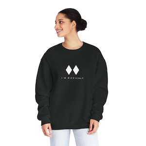May include: Black sweatshirt with a white double diamond graphic and the text "I'm Difficult".