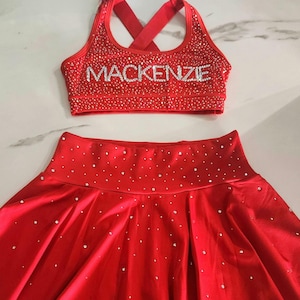 Flickors anpassade röda strass-atletiska sportset