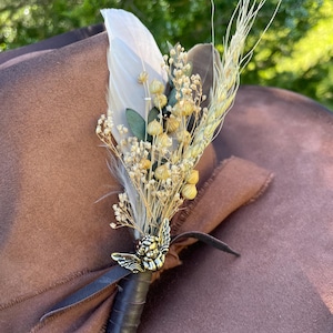 Clip-on feather/floral hat accessory bronze angel