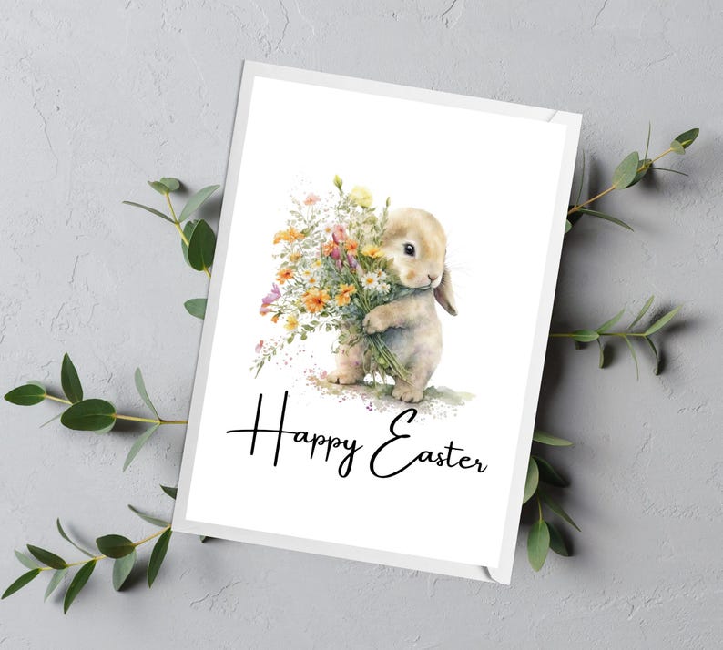 May include: A white bunny holding a bouquet of yellow, orange, and white flowers. The bunny is standing on a white background with the text "Happy Easter" written below it.