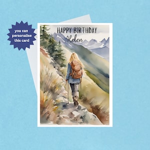 May include: A watercolour painting of a woman hiking in a mountain landscape. The text "HAPPY BIRTHDAY Helen" is at the top of the card.
