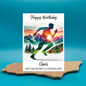 May include: A birthday card featuring a silhouette of a runner against a colourful mountain landscape. The card reads "Happy Birthday Chris. Hope your birthday is a personal best!"