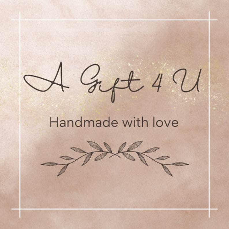May include: A white background with a gold glitter overlay. The text "A Gift 4 U" is written in black cursive script. Below the text is the phrase "Handmade with love" in black text. A black floral design is below the text.