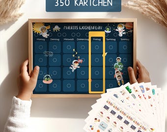 May include: A blue and white weekly planner with a space theme. The planner has a wooden frame and includes 350 stickers. The stickers feature various space-themed images, including astronauts, planets, and stars.
