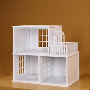 May include: A white doll's house with two floors, a balcony, and windows. The doll's house is on a brown platform.