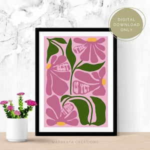 May include: Pink floral print with the text "The best is yet to come" in a retro style. The print features stylized flowers with yellow centers and green leaves.