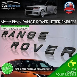 May include: A set of matte black individual letters forming the words RANGE ROVER. The letters are designed as a vehicle emblem with a flat, non-reflective finish. The text is displayed in a bold, sans-serif font style for automotive application.