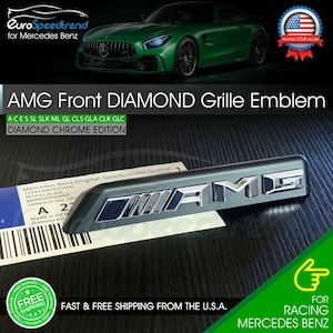 May include: A dark gray AMG Front Diamond Grille Emblem with chrome accents. The emblem is for Mercedes Benz vehicles. The image includes text that reads "AMG Front DIAMOND Grille Emblem" and "DIAMOND CHROME EDITION."