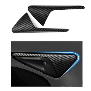 May include: A pair of black carbon fiber car door handle covers. The covers are designed to fit over the existing door handles and give them a sporty look.