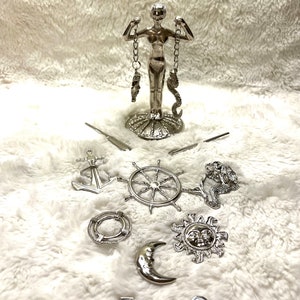 Olokun Tools and Ceramic Tinajas