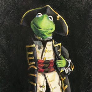 May include: A green frog character in a pirate costume, complete with a black tricorn hat, a black coat with gold trim, and tan boots. The frog is smiling and giving a thumbs up. The artwork is signed "Joe Lover To Draw".