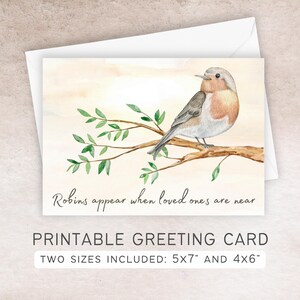May include: A watercolor greeting card featuring a robin perched on a branch with green leaves. The card has the text "Robins appear when loved ones are near." The card is accompanied by an envelope. The card is available in 5x7 inch and 4x6 inch sizes.