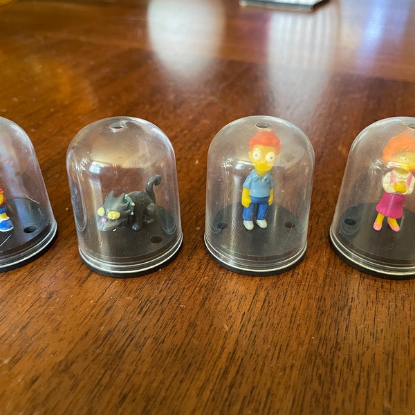 Lot of four mini-Simpsons characters in domes