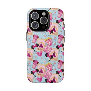 May include: A blue and pink phone case with a pattern of Mickey Mouse ears, popcorn buckets, cameras, and the words "Disney" and "Magic".