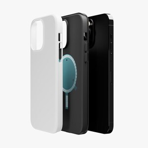 May include: Three smartphone cases arranged in a row. The first is a solid white case, the second is a black case featuring a circular blue magnetic charging icon on the back, and the third is a solid black smartphone with a visible camera lens.
