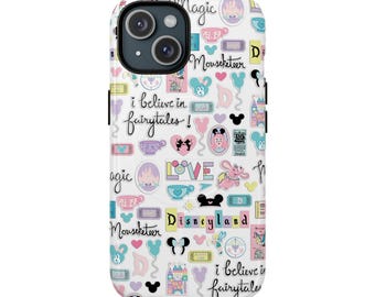 May include: White iPhone case with a colorful pattern of Disney-themed icons, including Mickey Mouse, castles, and teacups. The case features the phrases "Magic," "Mouseketeer," "Disneyland," and "I believe in fairytales!"