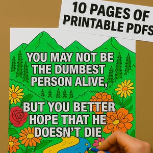 Könnte beinhalten: Eine Malvorlage mit dem Text "YOU MAY NOT BE THE DUMBEST PERSON ALIVE, BUT YOU BETTER HOPE THAT HE DOESN'T DIE." Die Seite zeigt grüne Berge, Bäume, Blumen und einen blauen Fluss. Eine Hand malt den Fluss mit einem blauen Buntstift aus. Oben rechts steht "10 PAGES OF PRINTABLE PDFs."