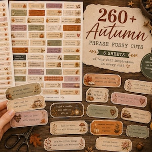 May include: A collection of rectangular paper labels featuring autumn-themed phrases and illustrations. The sheets include text such as 260+ Autumn Phrase Fussy Cuts, with various designs showing pumpkins, leaves, and cozy motifs in muted earth tones.