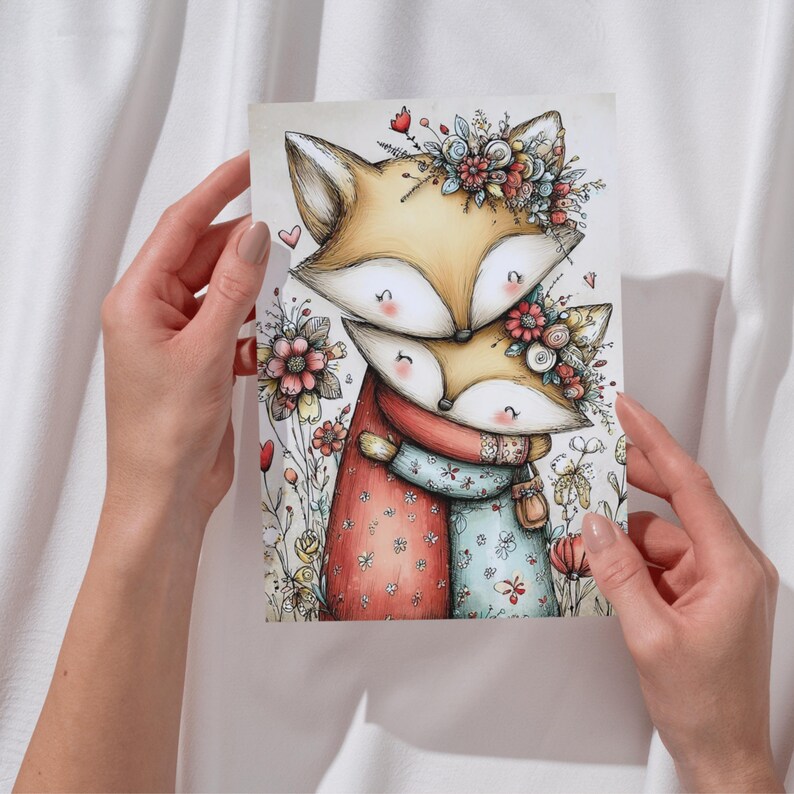 May include: A watercolor illustration of two foxes hugging, adorned with floral crowns. The foxes are depicted in warm tones, wearing dresses with floral patterns. The background features flowers and hearts, creating a whimsical and loving scene.