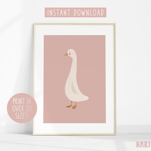 May include: A printable digital art print featuring a white goose with a pink blush on its cheeks, standing on a light pink background. The text "INSTANT DOWNLOAD" is at the top of the image and "PRINT IN OVER 20 SIZES!" is at the bottom left.