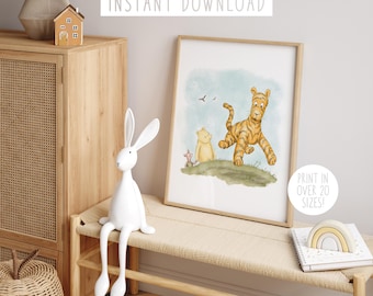 May include: A printable illustration of a tiger and a bear walking together. The tiger is orange and black with a white stripe on its face. The bear is yellow and has a brown nose. The background is a light blue watercolor wash. The text "Print in over 20 sizes!" is in the lower right corner.