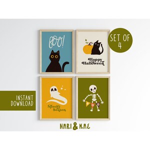 May include: Set of four printable Halloween illustrations. The illustrations feature a black cat with the text "BOO!" in a blue frame, a black cat with a pumpkin and the text "Happy Halloween" in a beige frame, a ghost with the text "Spooky Season" in a yellow frame, and a skeleton with the text "BOO!" in a green frame.