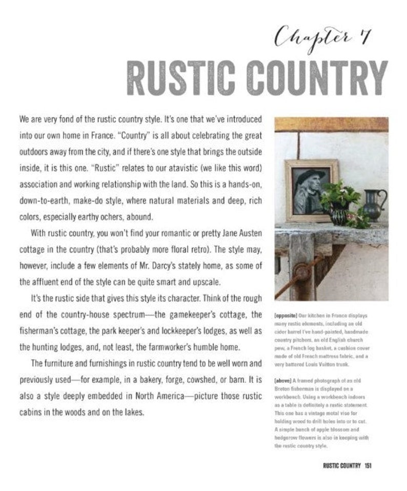 May include: A rustic country style interior design featuring a wooden table with a vintage metal vise, a framed photograph of a fisherman, and a simple arrangement of apples and flowers. The text "RUSTIC COUNTRY 151" is visible in the bottom right corner.