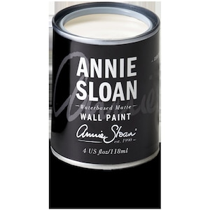 May include: A white, water-based matte wall paint in a 4 US fl oz / 118 ml can. The can is black with white text that reads "Annie Sloan - Waterbased Matte - WALL PAINT - Annie Sloan est. 1990 - 4 US fl oz / 118 ml".
