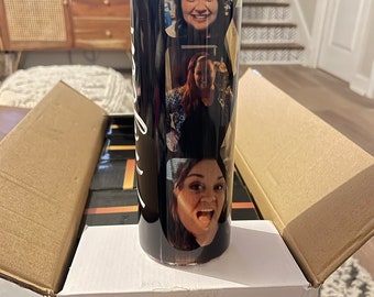May include: A black and white tumbler with three different photos of women on it. The photos are in a vertical stack. The tumbler is sitting on a white box.