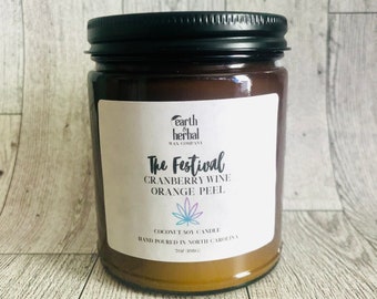 Vela del Festival: Vela de soja y coco con aroma a vino de arándanos y cáscara de naranja