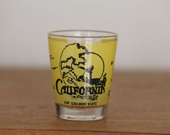 Vintage yellow California surfing souvenir shot glass