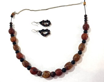 Brown and black beaded necklace with earrings