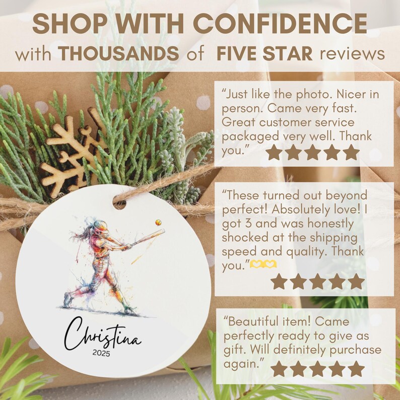 May include: A round, white ornament featuring a watercolor illustration of a softball player swinging a bat. The name "Christina" and the year "2025" are written below the image. The ornament is part of a gift set.