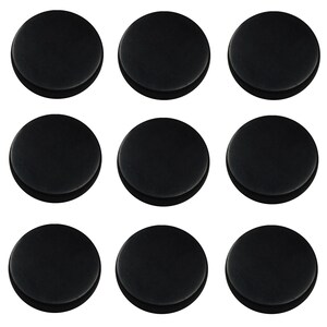May include: Nine black round felt pads, each about 2 inches in diameter.