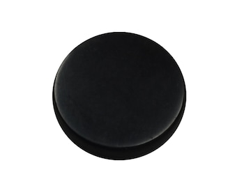 May include: A black round button with a smooth surface.