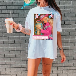  Barbie Camiseta de manga corta para mujer, Muñecas para mujer  con logotipo rosa clásico camiseta gráfica blanca