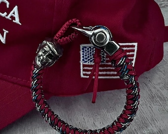 TRUMP this bracelet, a novelty paracord bracelet with charm and snap shackle, catapult clasp