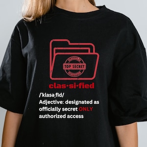 Classified Top Secret Folder (Clas-si-fied) Dictionary  Style Definition T-shirt. - Unisex Heavy Cotton Tee (Sizes S - 5 XL)
