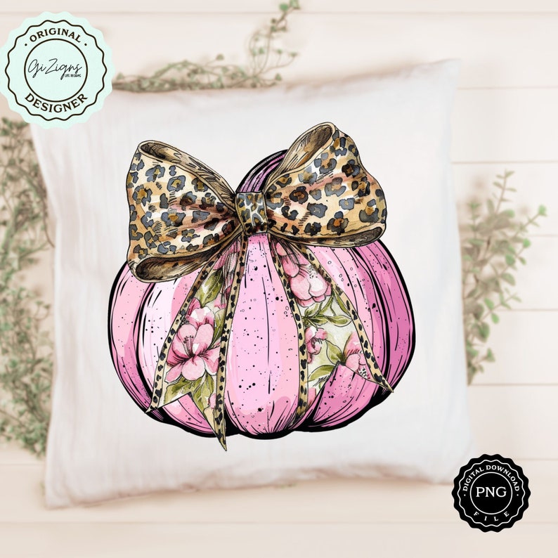 Pode incluir: Uma ab&oacute;bora rosa com um padr&atilde;o floral e um la&ccedil;o de estampa de leopardo. A ab&oacute;bora &eacute; desenhada em estilo aquarela.