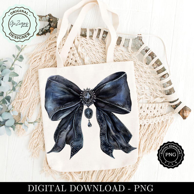 May include: A white tote bag with a black watercolor bow with a large rhinestone embellishment. The bow is centered on the bag and has a large, ornate rhinestone in the center. The bow is tied with a large, flowing loop and has a smaller rhinestone hanging from the center.